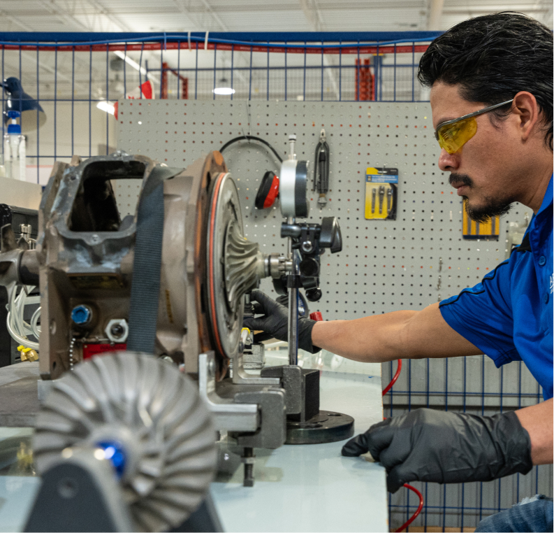 People working on a pneumatic system.